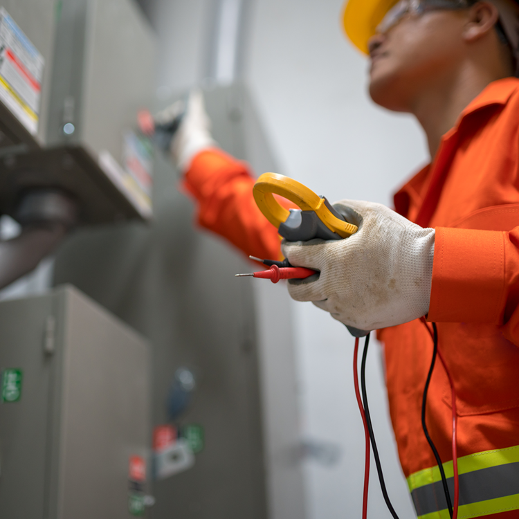 Engineer checking voltage